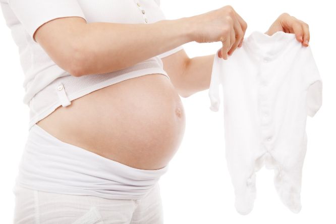 Babykleding met zwangere buik